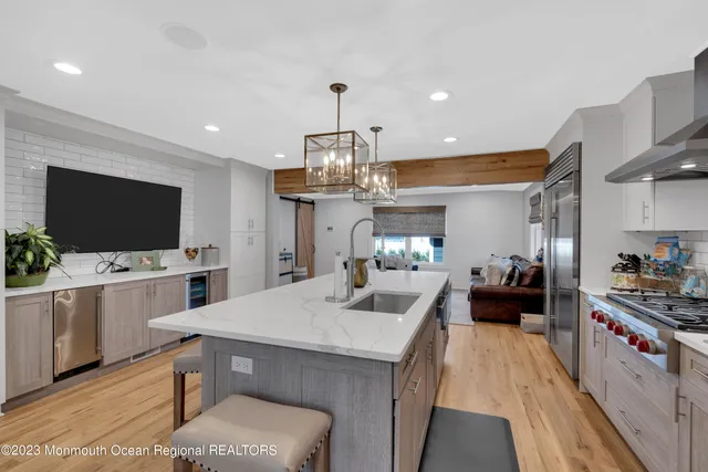 a spacious bedroom with a bed and a window