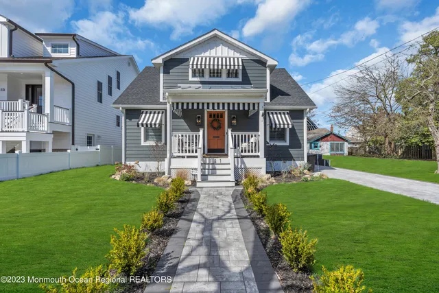 a large kitchen with a table and chairs