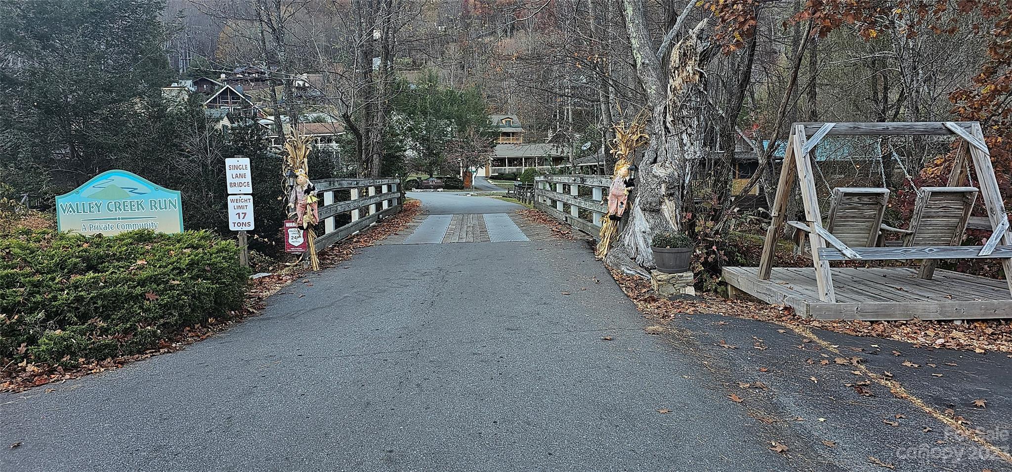 106 Silverleaf Circle Maggie Valley, NC 28751 - Photo 14 of 15 a view of a house with a yard and pathway