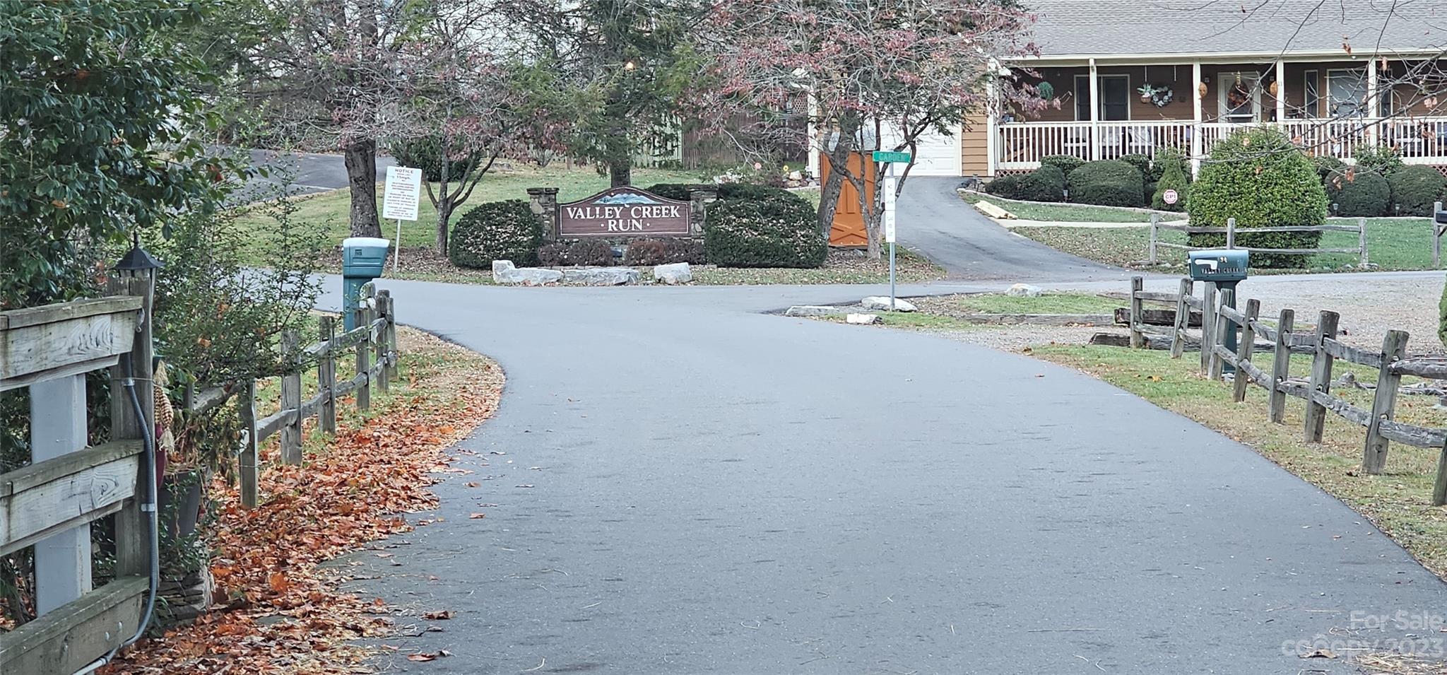 106 Silverleaf Circle Maggie Valley, NC 28751 - Photo 8 of 15 a view of a house with a yard