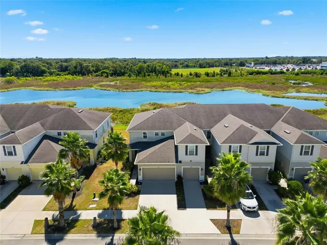 an aerial view of a house with a outdoor space