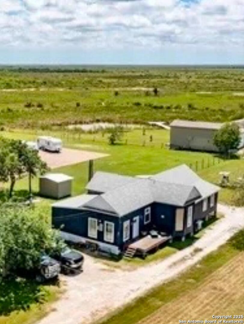 71 Avril Drive Port Lavaca, TX 77979 - Photo 1 of 19 a aerial view of a house with a ocean view