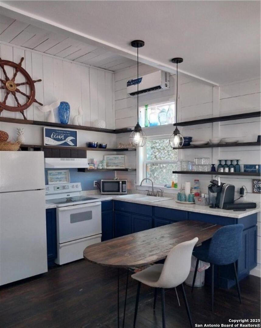 71 Avril Drive Port Lavaca, TX 77979 - Photo 14 of 19 a kitchen with stainless steel appliances granite countertop a sink a stove and refrigerator