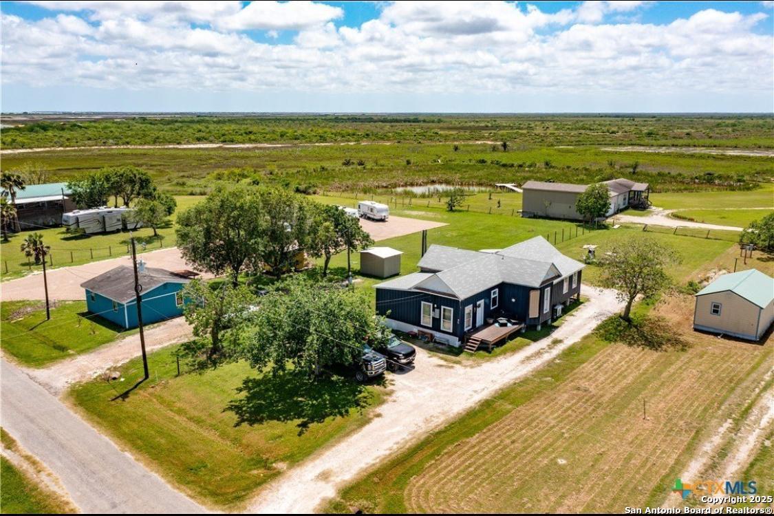 71 Avril Drive Port Lavaca, TX 77979 - Photo 2 of 19 a view of a swimming pool with an ocean view