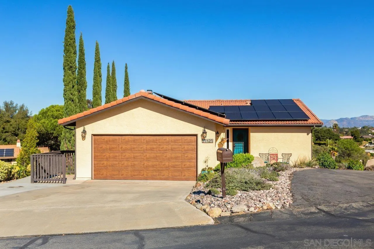 28423 Wimbleton Lane Escondido, CA 92026 - Photo 1 of 25 a view of a house with a yard and potted plants