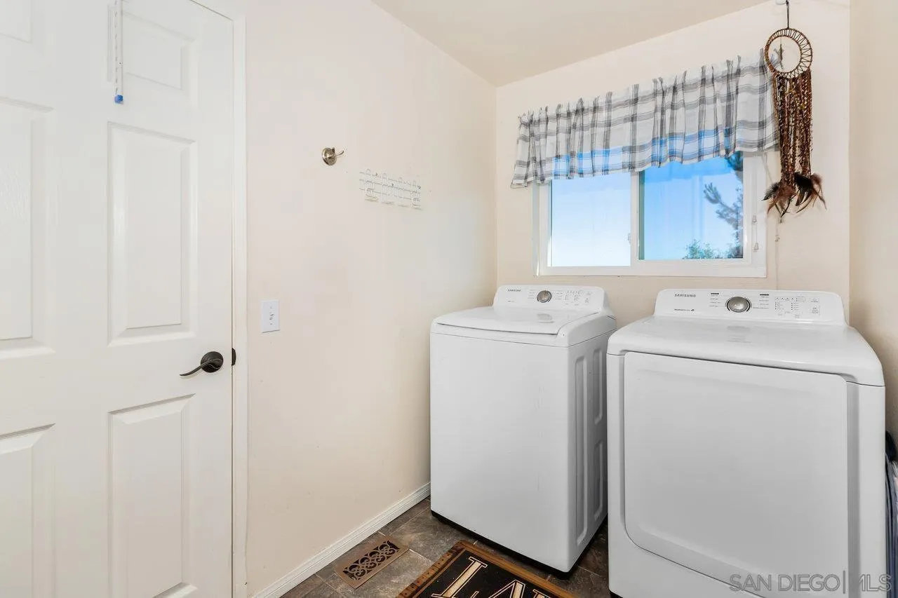 28423 Wimbleton Lane Escondido, CA 92026 - Photo 12 of 25 a utility room with dryer and washer