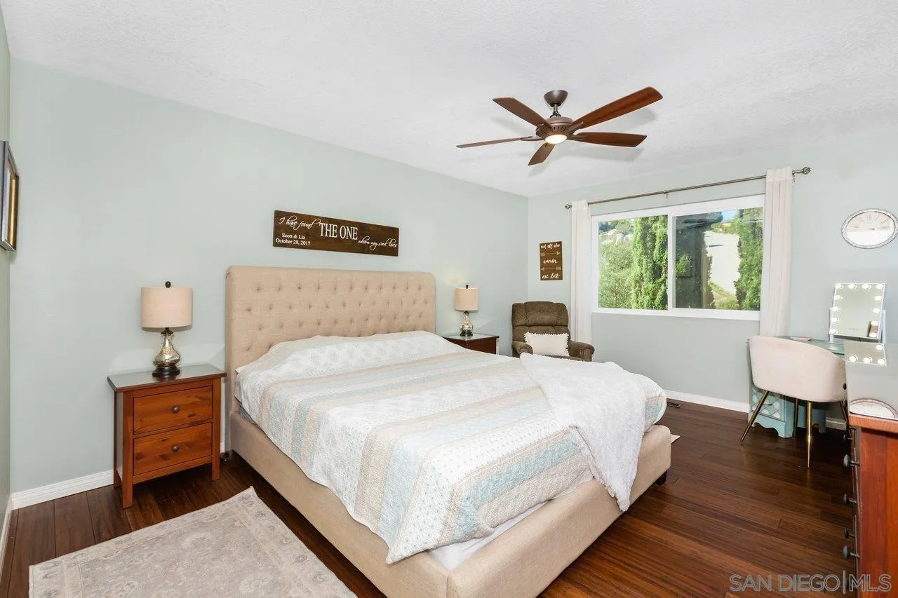 28423 Wimbleton Lane Escondido, CA 92026 - Photo 14 of 25 a bedroom with a bed and window