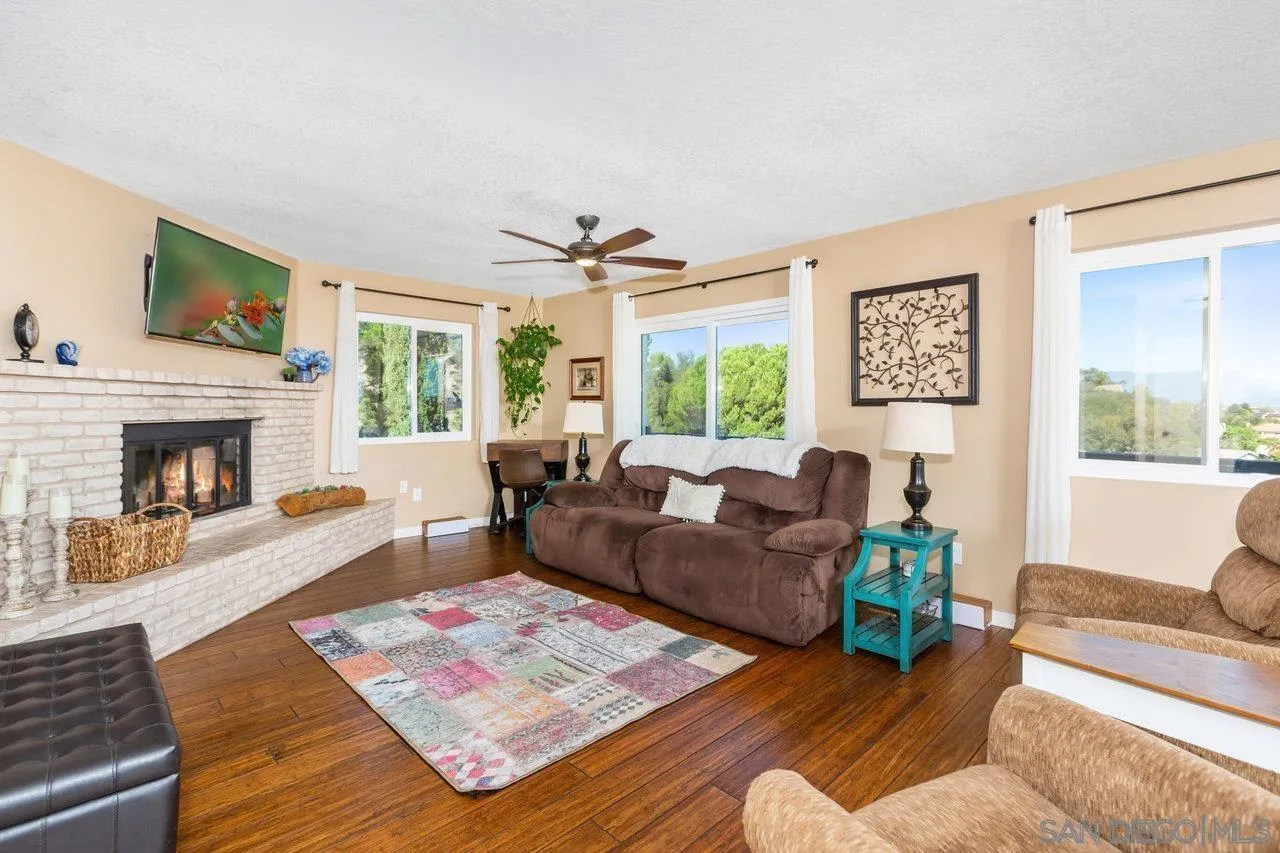 28423 Wimbleton Lane Escondido, CA 92026 - Photo 3 of 25 a living room with furniture rug and window