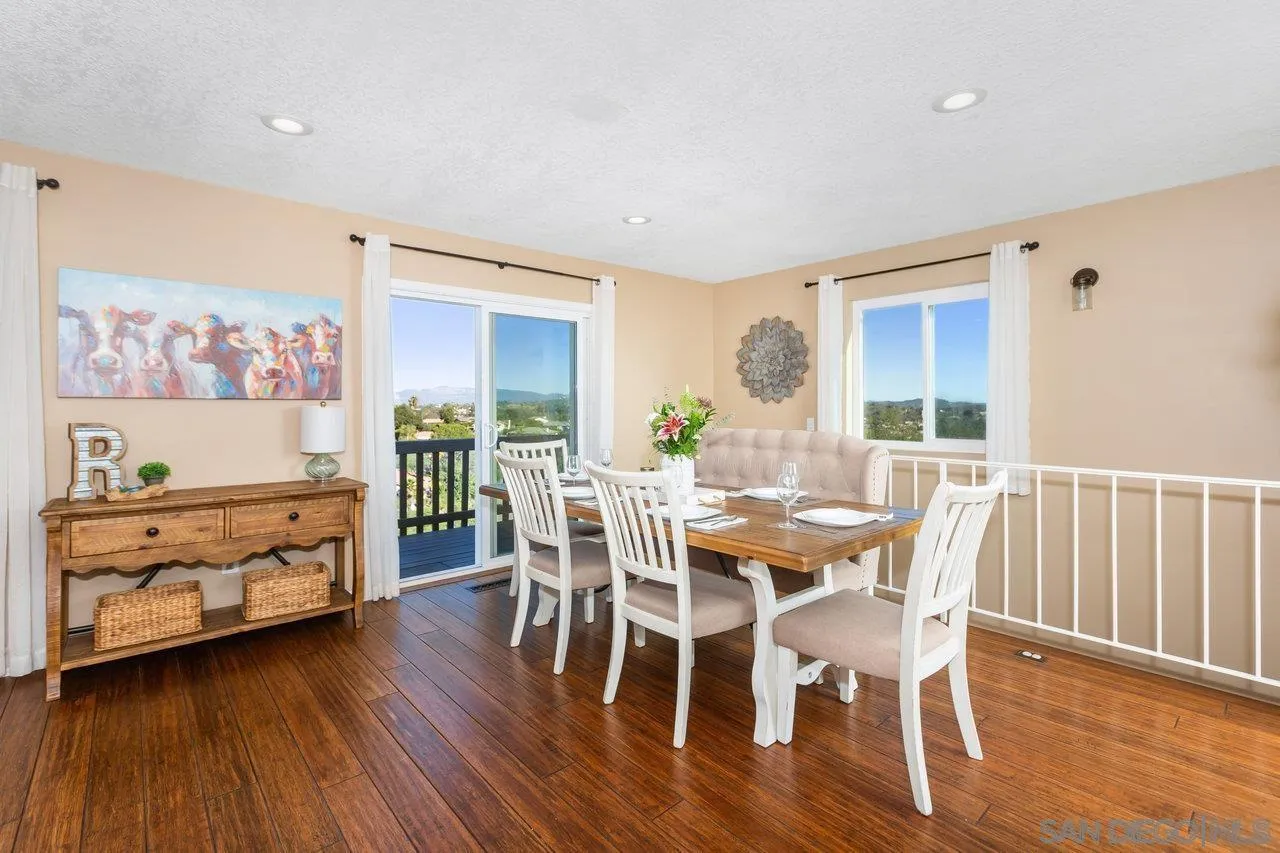 28423 Wimbleton Lane Escondido, CA 92026 - Photo 5 of 25 a view of a dining room with furniture window and wooden floor