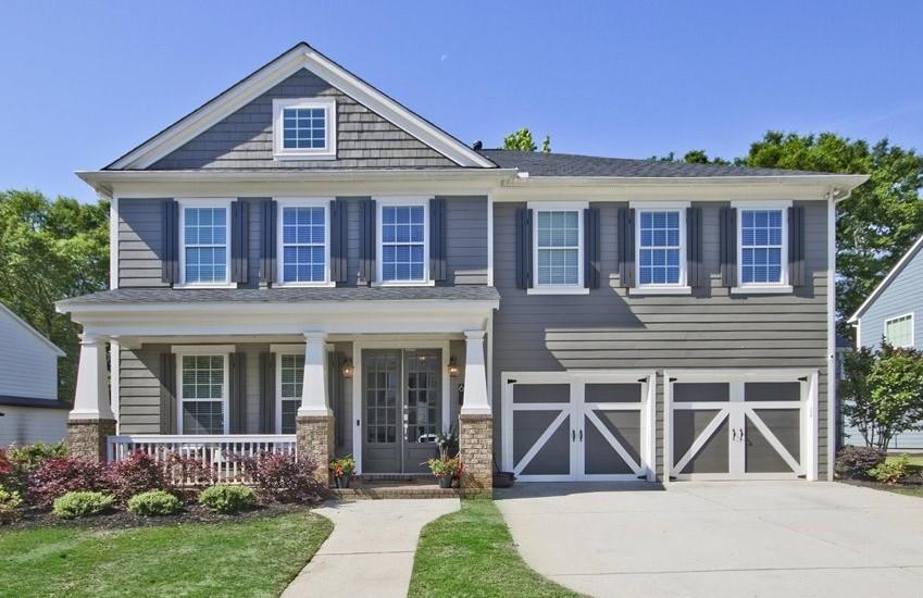 6106 Baybrook Trace Hoschton, GA 30548 - Photo 1 of 1 front view of a house with a yard