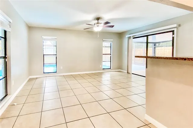 a view of an empty room and window