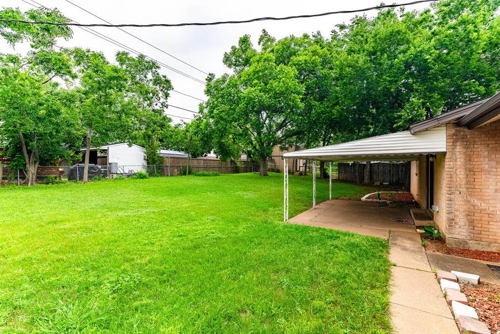 3213 Thames Street Irving, TX 75062 - Photo 22 of 25 a view of a house with backyard