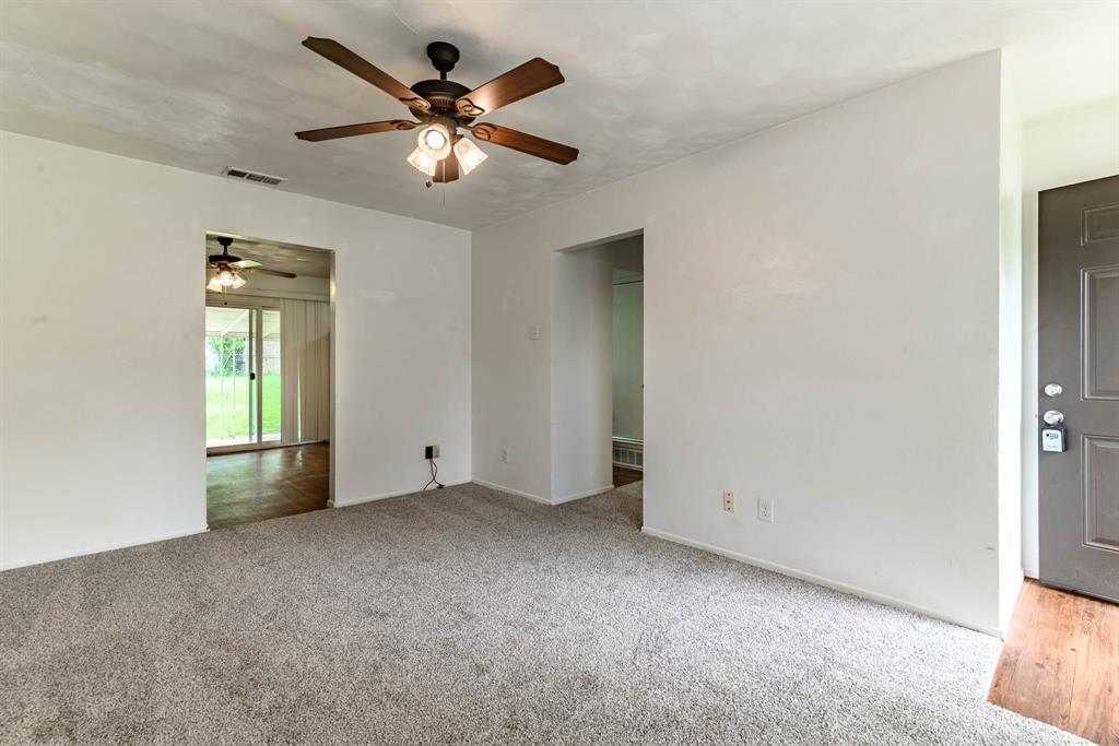 3213 Thames Street Irving, TX 75062 - Photo 5 of 25 a view of an empty room with a window