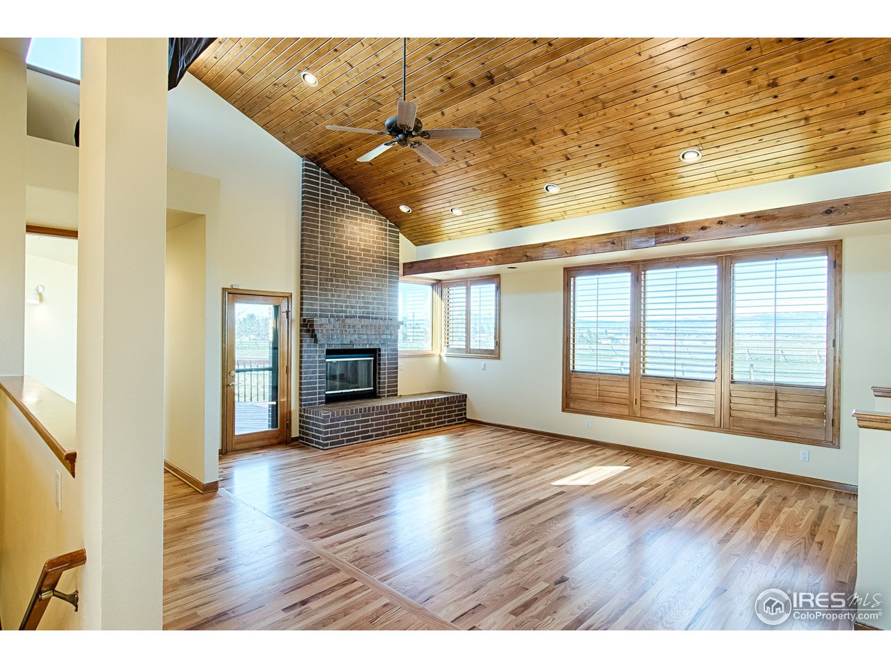 7412 Rodeo Drive Longmont, CO 80504 - Photo 8 of 25 Living Room with Fireplace