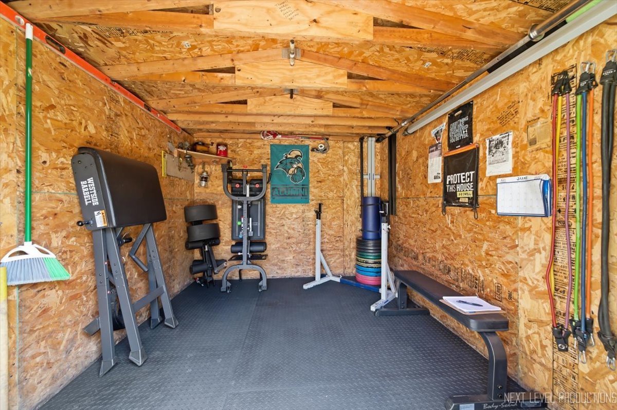 10 Shermead Road Montgomery, IL 60538 - Photo 22 of 30 a view of a room with gym equipment