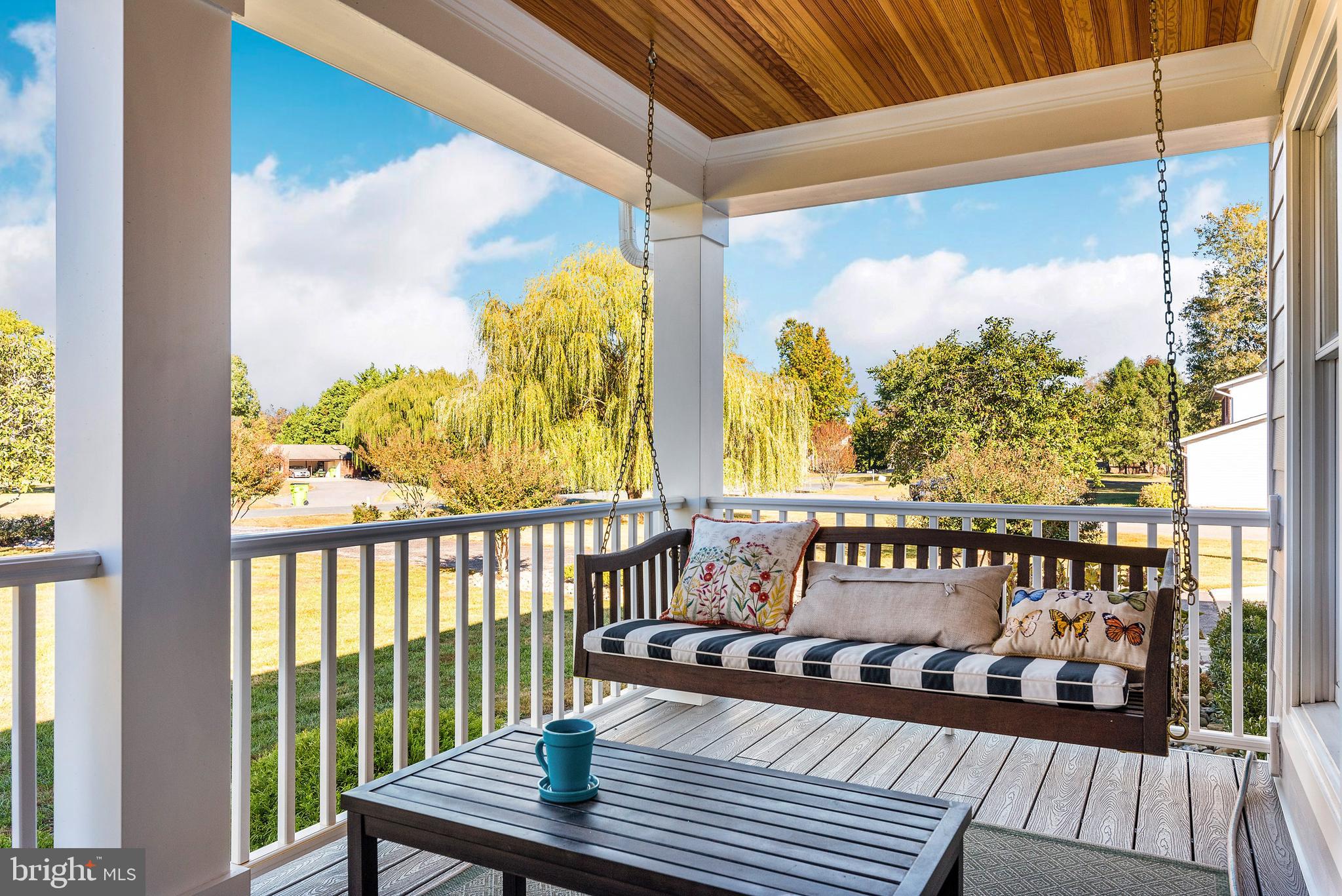 602 Old Point Road Chester, MD 21619 - Photo 37 of 51 a view of a balcony with two chairs and a wooden floor
