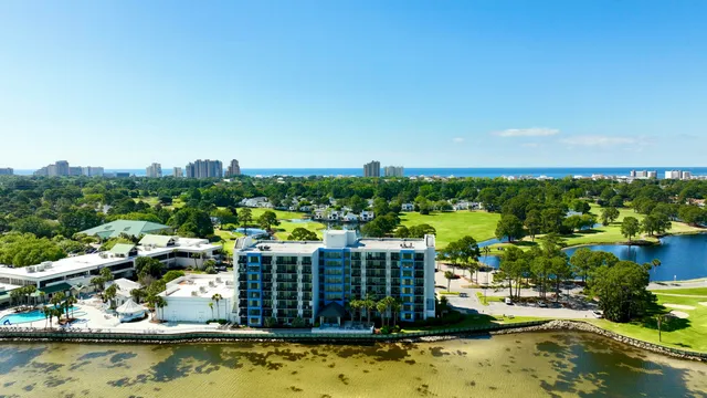 a view of a water with a building in the background