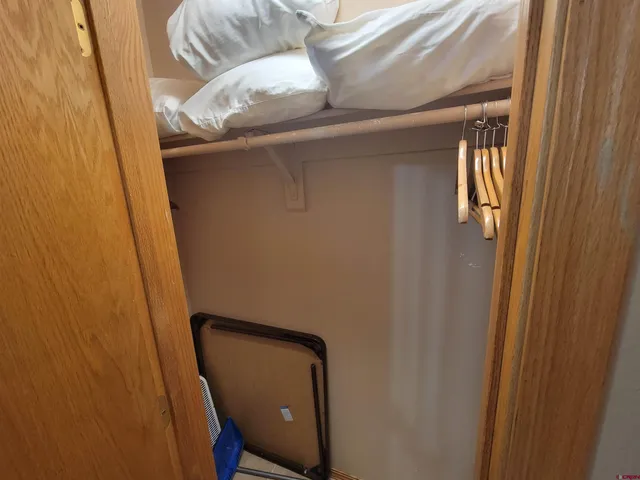 a bathroom with a shower curtain and a sink