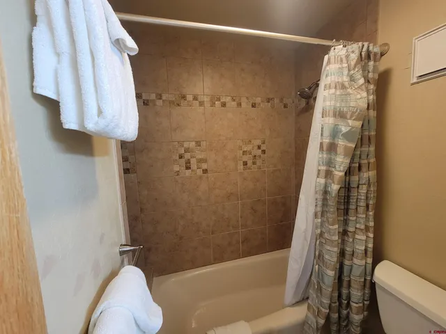 a view of a room with furniture window and outside view