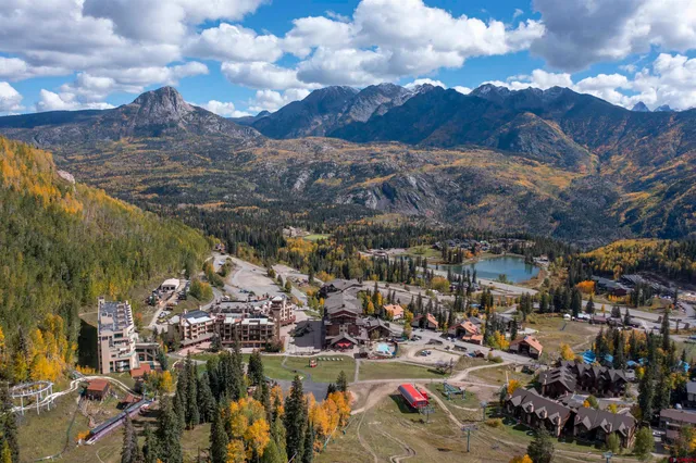 a view of a building with a yard