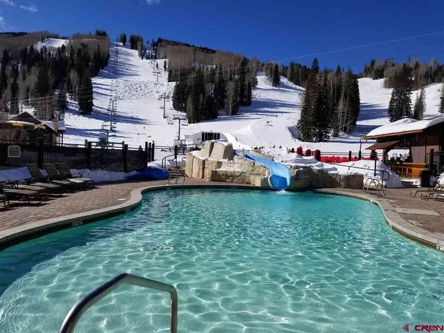 a park view with a slide