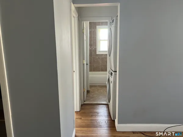 a view of a bathroom from a hallway