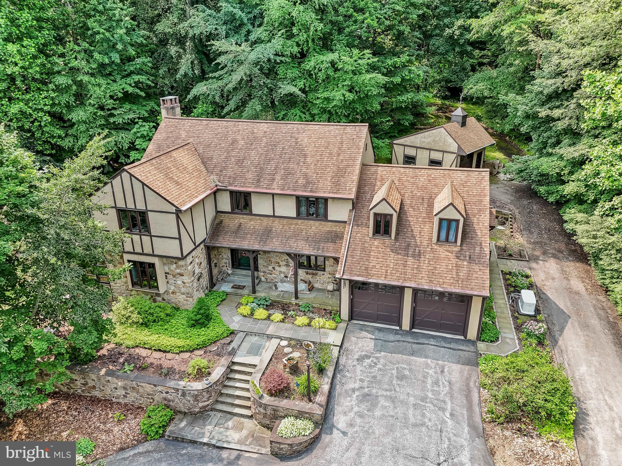1200 Dunsinane Hill Chester Springs, PA 19425 - Photo 2 of 42 an aerial view of a house with yard patio and fire pit