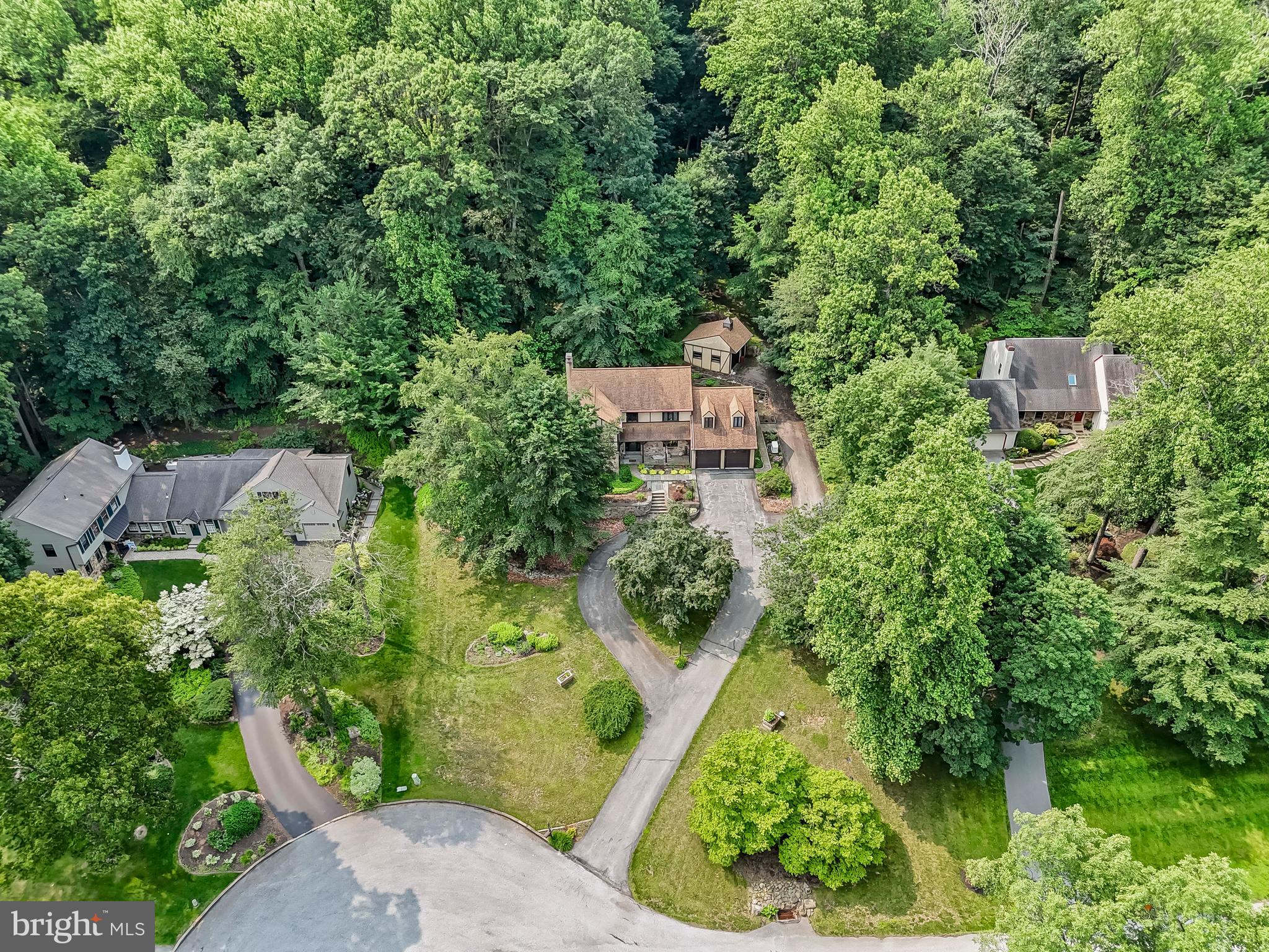 1200 Dunsinane Hill Chester Springs, PA 19425 - Photo 23 of 42 an aerial view of a house with a yard and outdoor seating