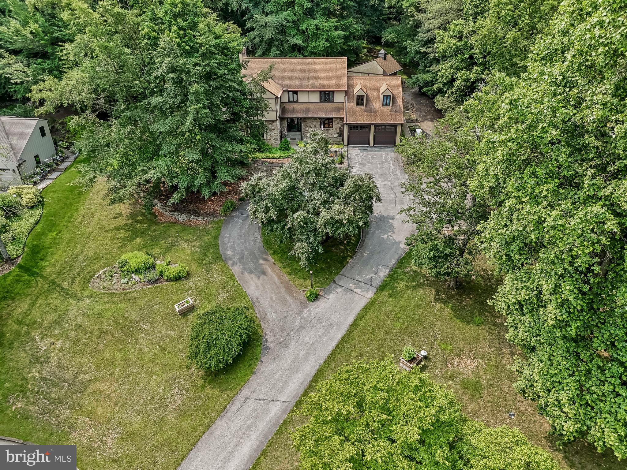 1200 Dunsinane Hill Chester Springs, PA 19425 - Photo 26 of 42 an aerial view of a house with a yard