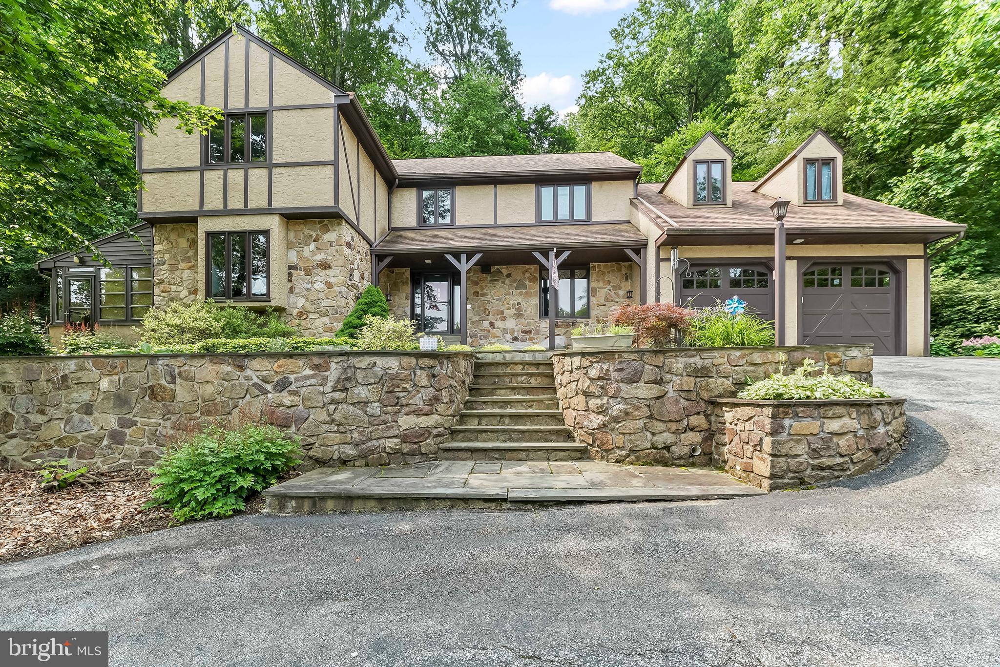 1200 Dunsinane Hill Chester Springs, PA 19425 - Photo 28 of 42 front view of a house with a yard