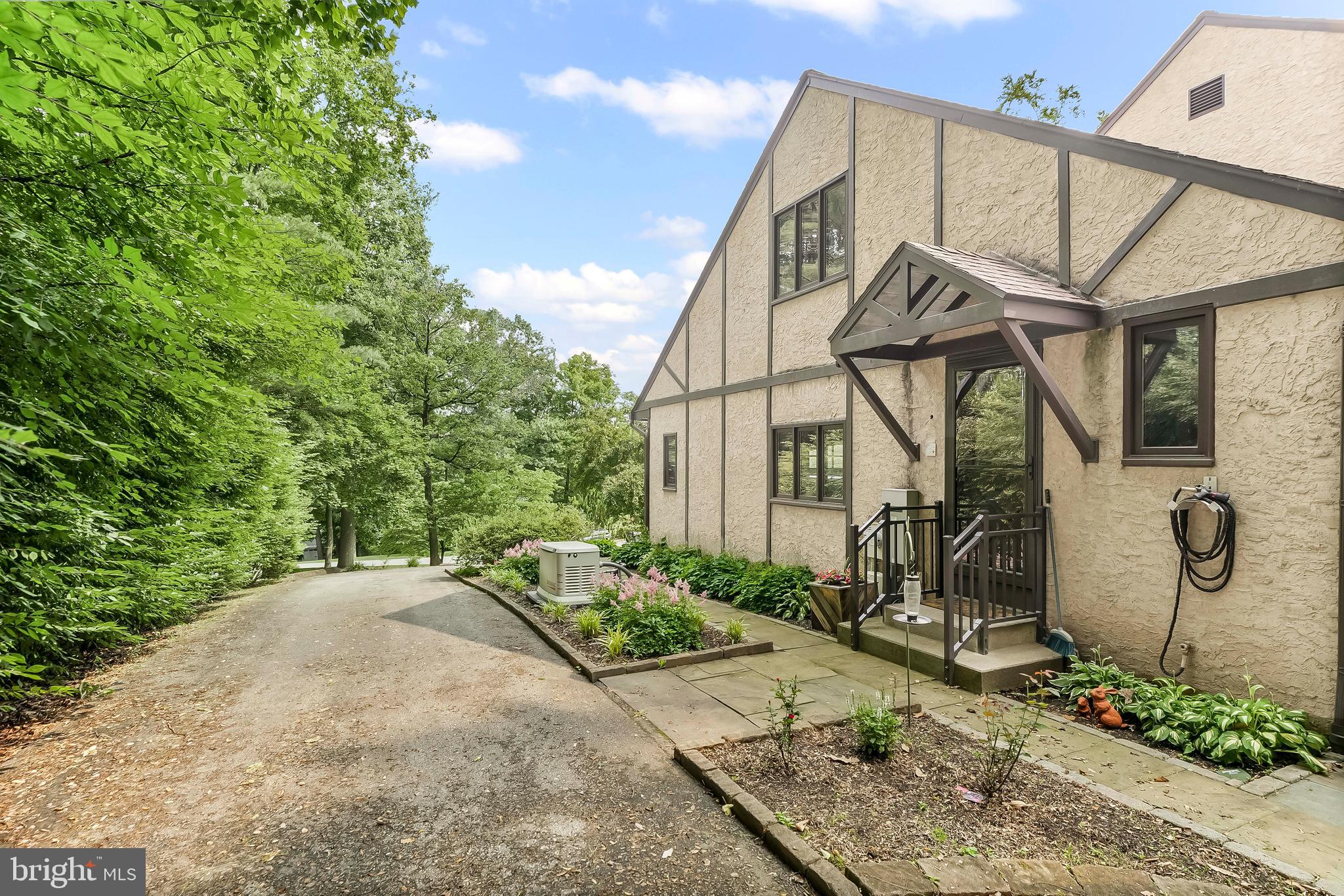 1200 Dunsinane Hill Chester Springs, PA 19425 - Photo 31 of 42 a house with trees in front of it