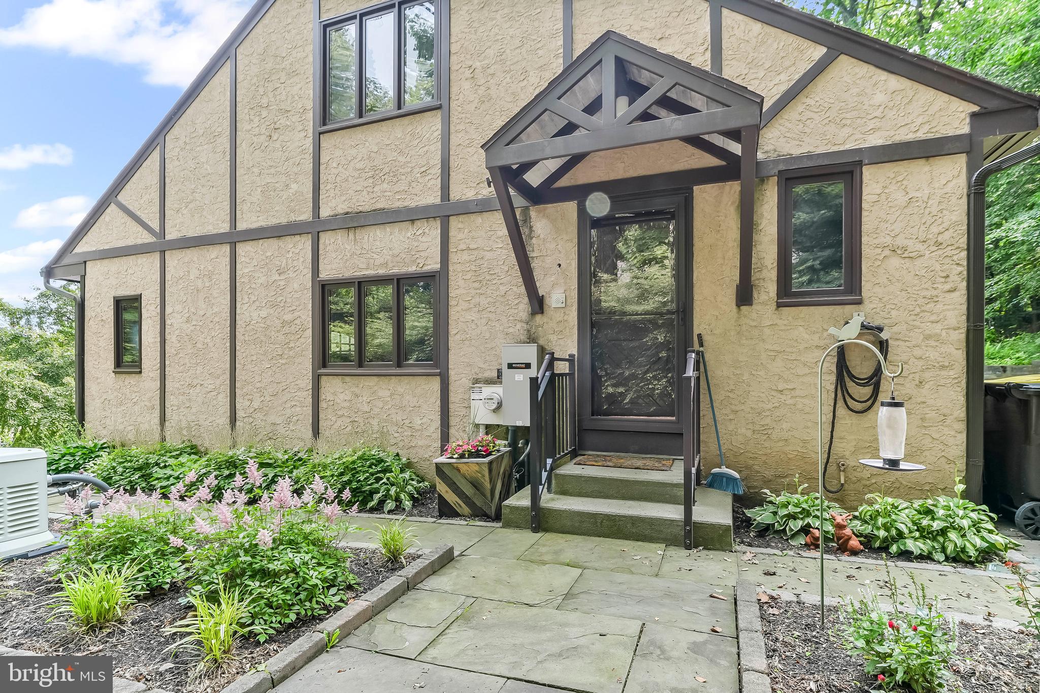 1200 Dunsinane Hill Chester Springs, PA 19425 - Photo 32 of 42 a front view of a house with garden