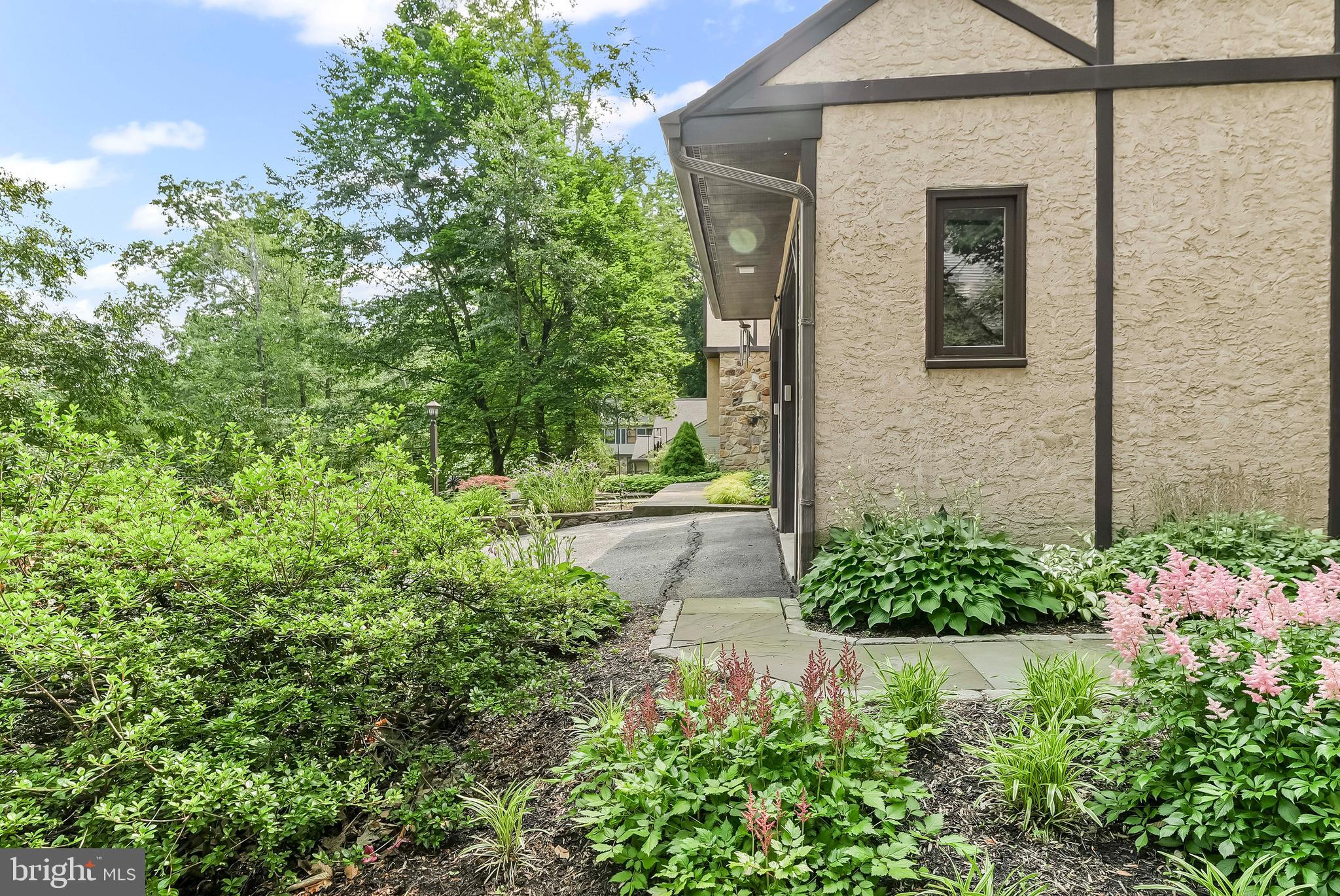 1200 Dunsinane Hill Chester Springs, PA 19425 - Photo 33 of 42 front view of a house with a yard