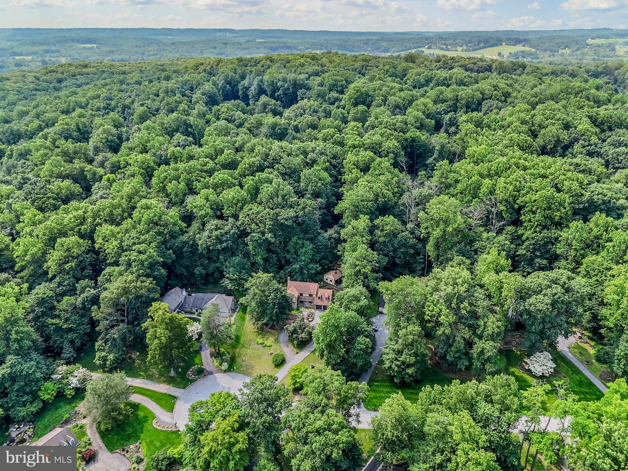 1200 Dunsinane Hill Chester Springs, PA 19425 - Photo 39 of 42 an aerial view of a house with a yard