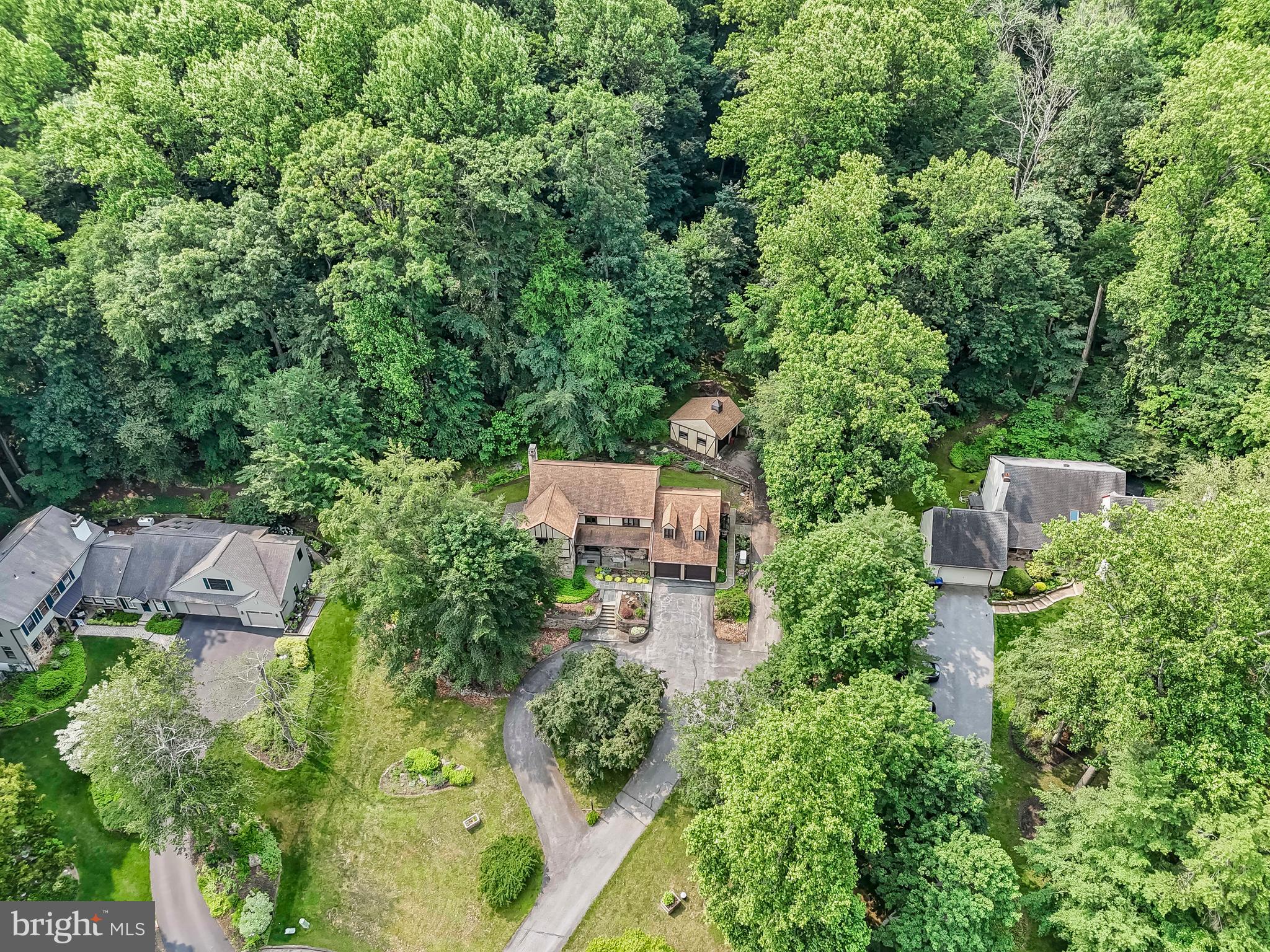 1200 Dunsinane Hill Chester Springs, PA 19425 - Photo 40 of 42 an aerial view of residential house with outdoor space and trees all around