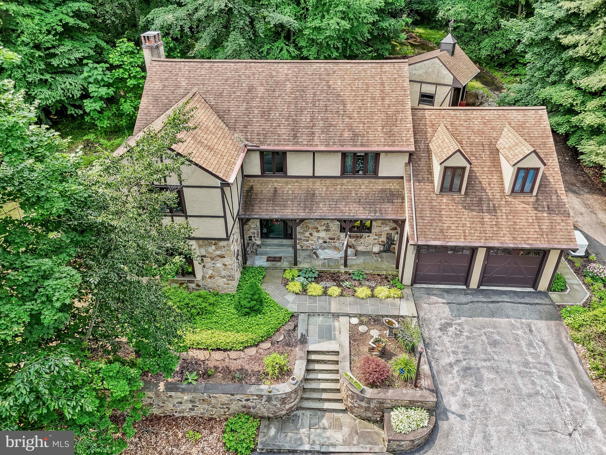 1200 Dunsinane Hill Chester Springs, PA 19425 - Photo 41 of 42 an aerial view of a house with a yard and potted plants