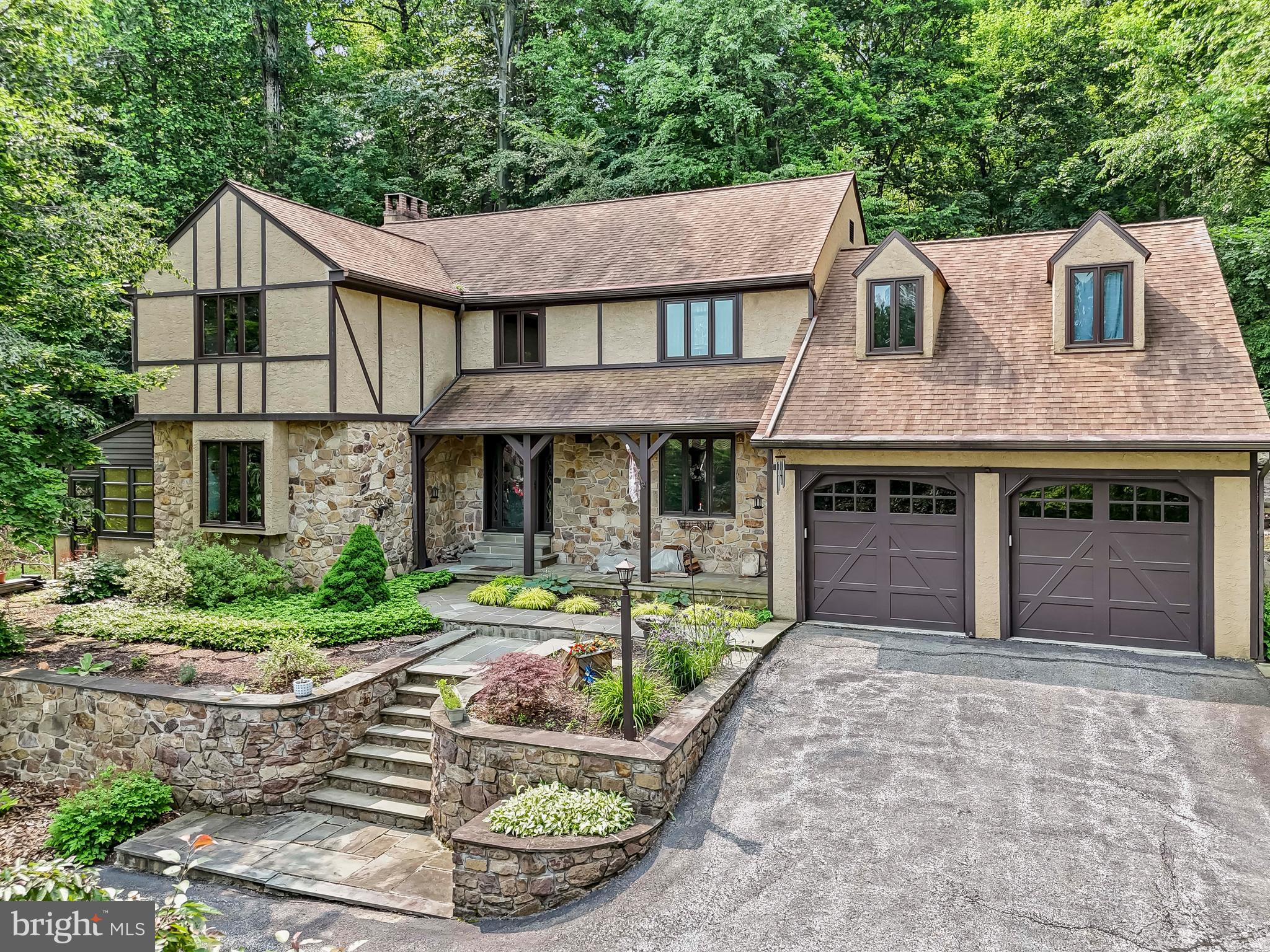 1200 Dunsinane Hill Chester Springs, PA 19425 - Photo 42 of 42 a front view of a house with garden