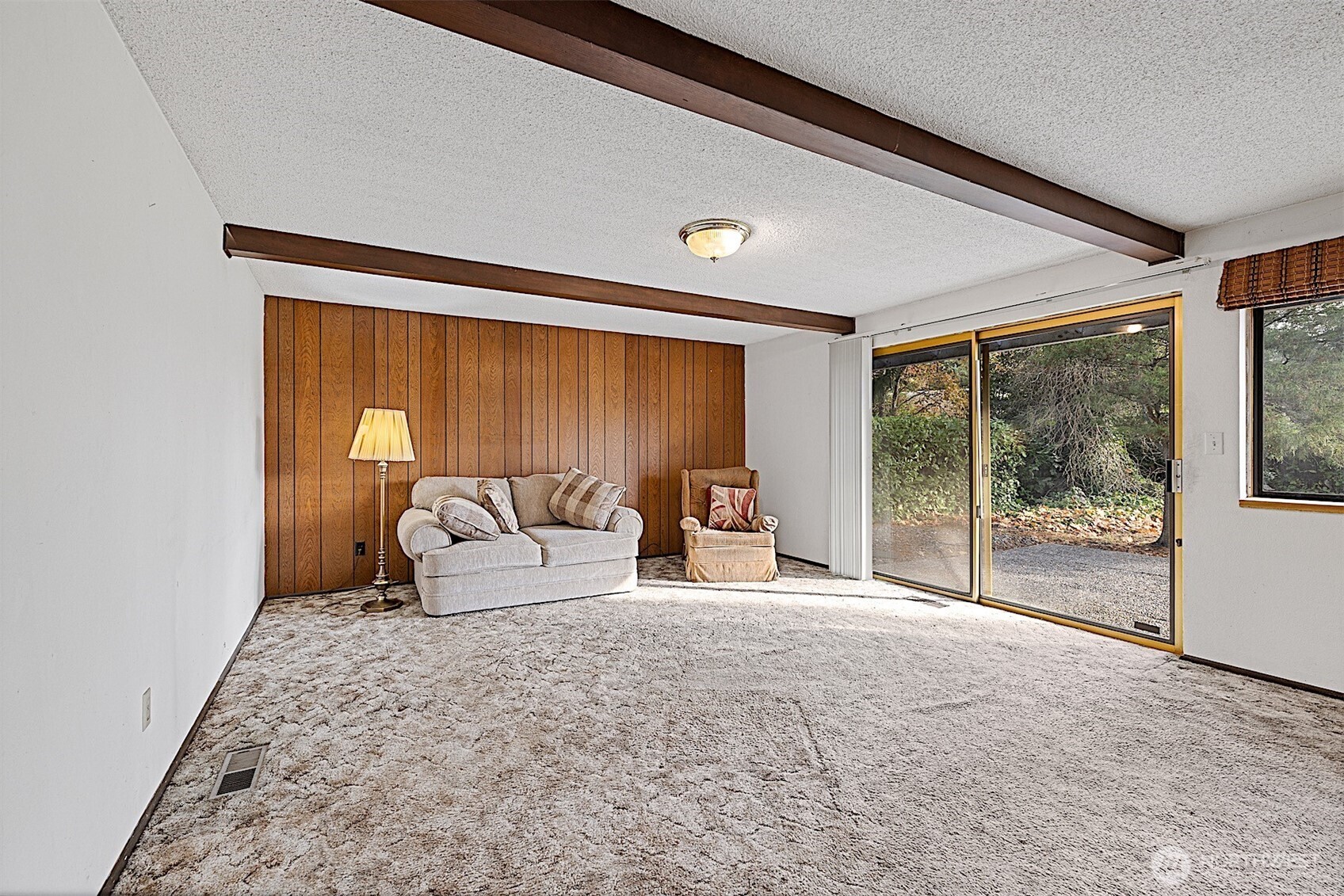 7407 Onyx Drive Southwest Lakewood, WA 98498 - Photo 14 of 40 a living room with furniture and a large window