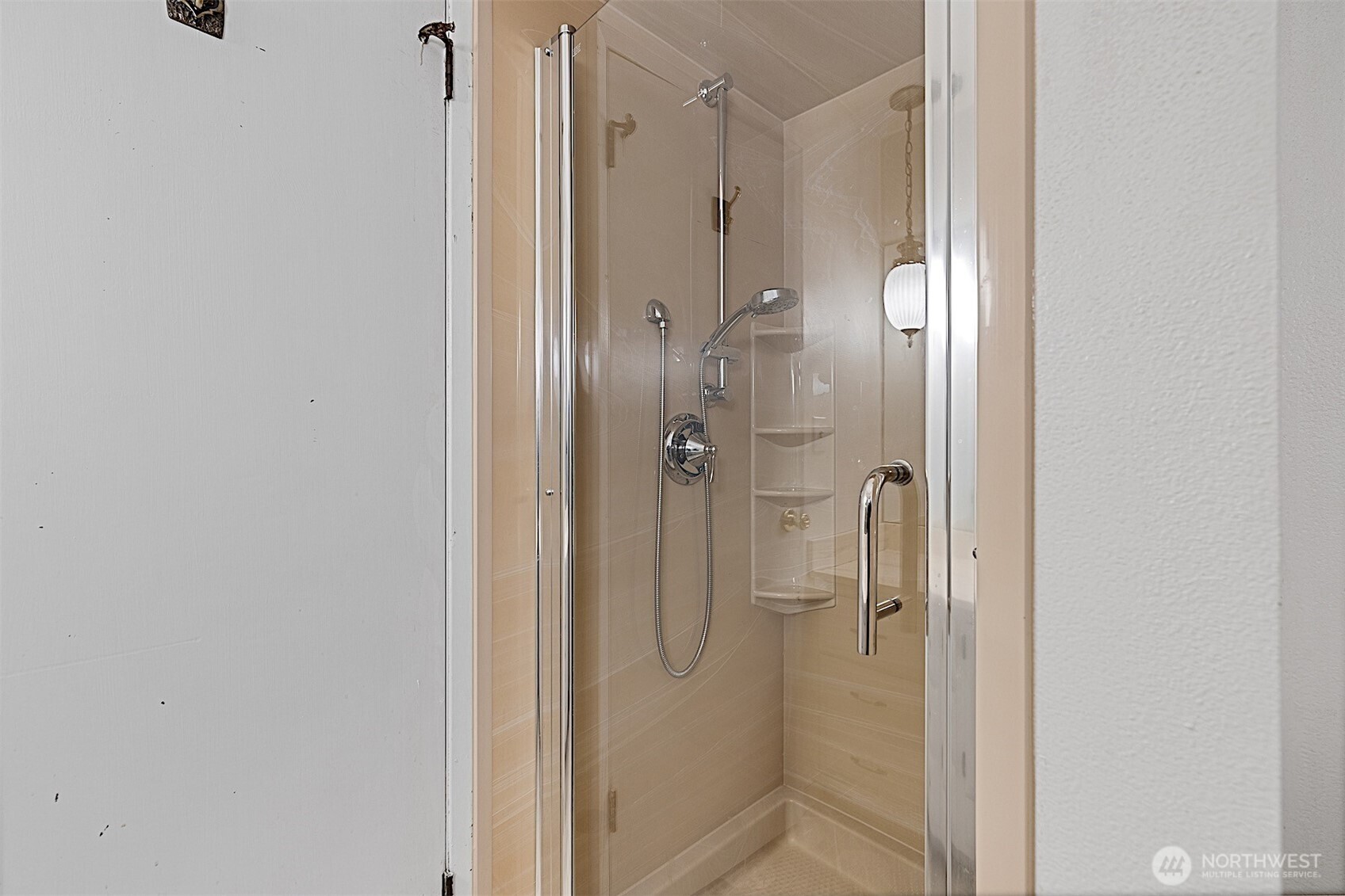 7407 Onyx Drive Southwest Lakewood, WA 98498 - Photo 29 of 40 a bathroom with a glass shower door