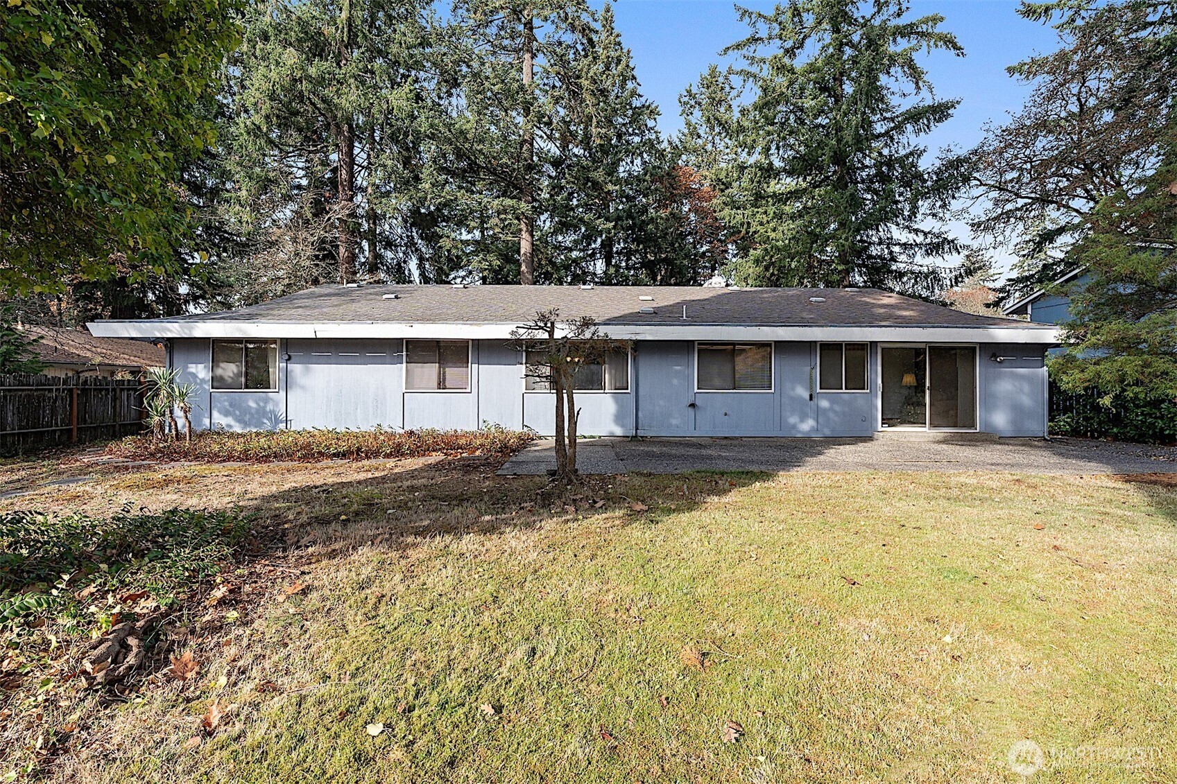 7407 Onyx Drive Southwest Lakewood, WA 98498 - Photo 34 of 40 a front view of a house with a yard