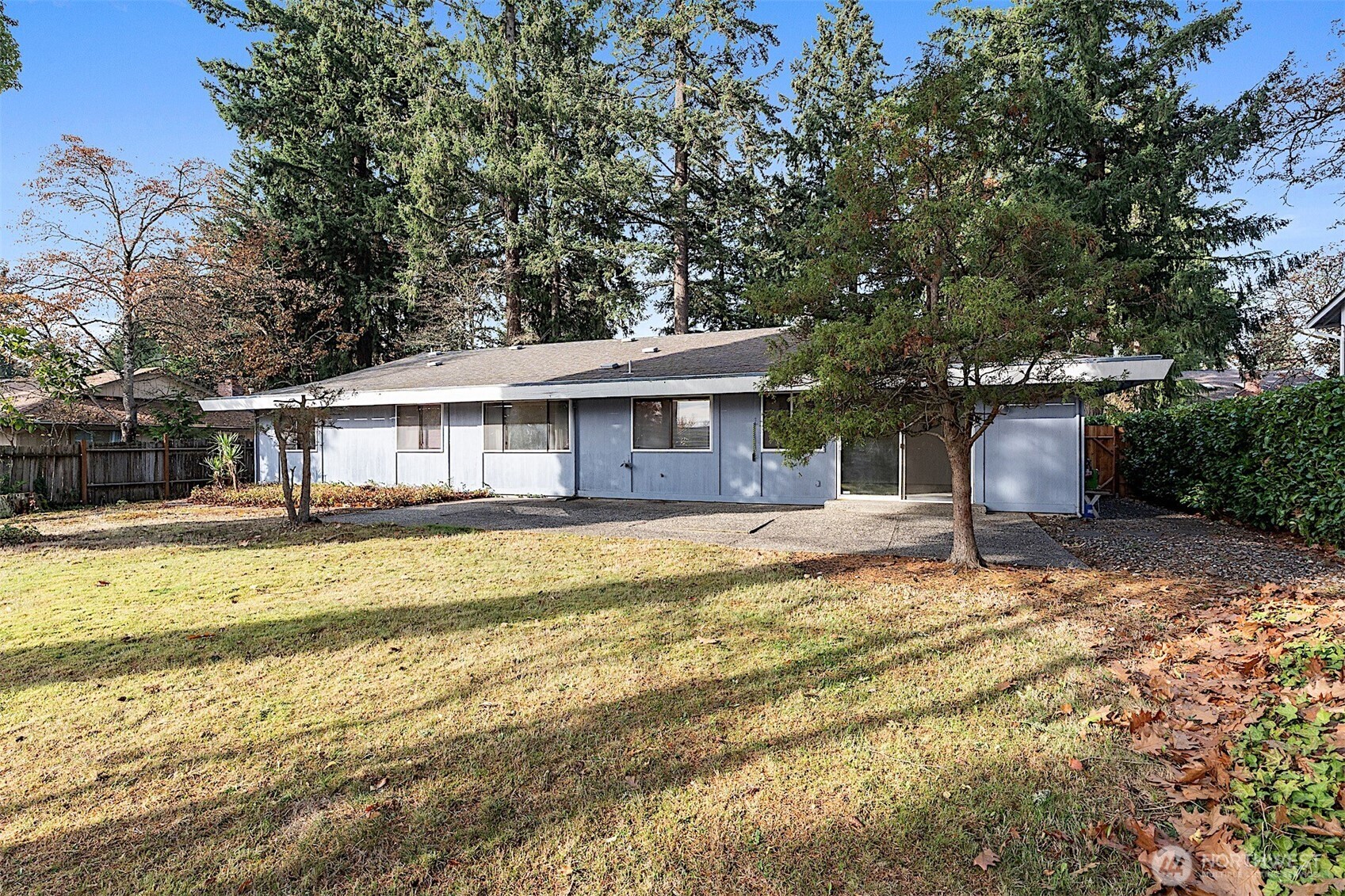 7407 Onyx Drive Southwest Lakewood, WA 98498 - Photo 35 of 40 a view of a house with a swimming pool