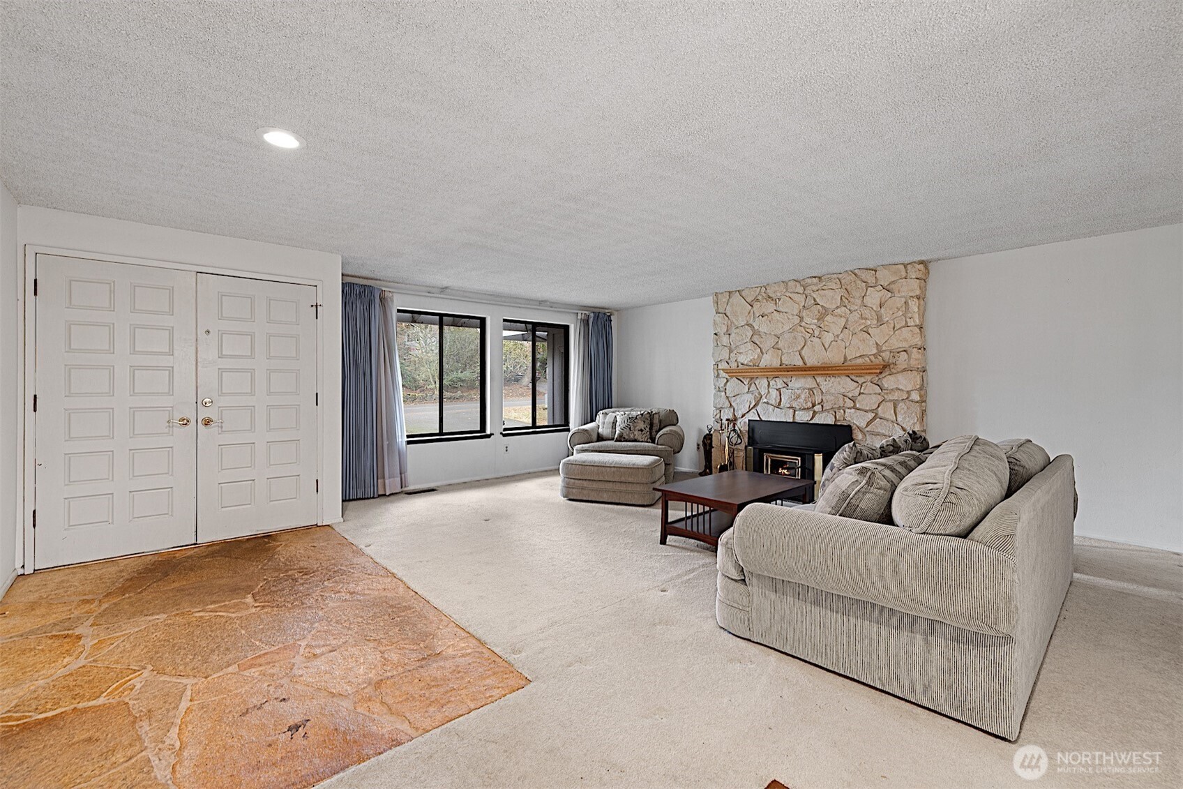 7407 Onyx Drive Southwest Lakewood, WA 98498 - Photo 4 of 40 a living room with furniture and a couch