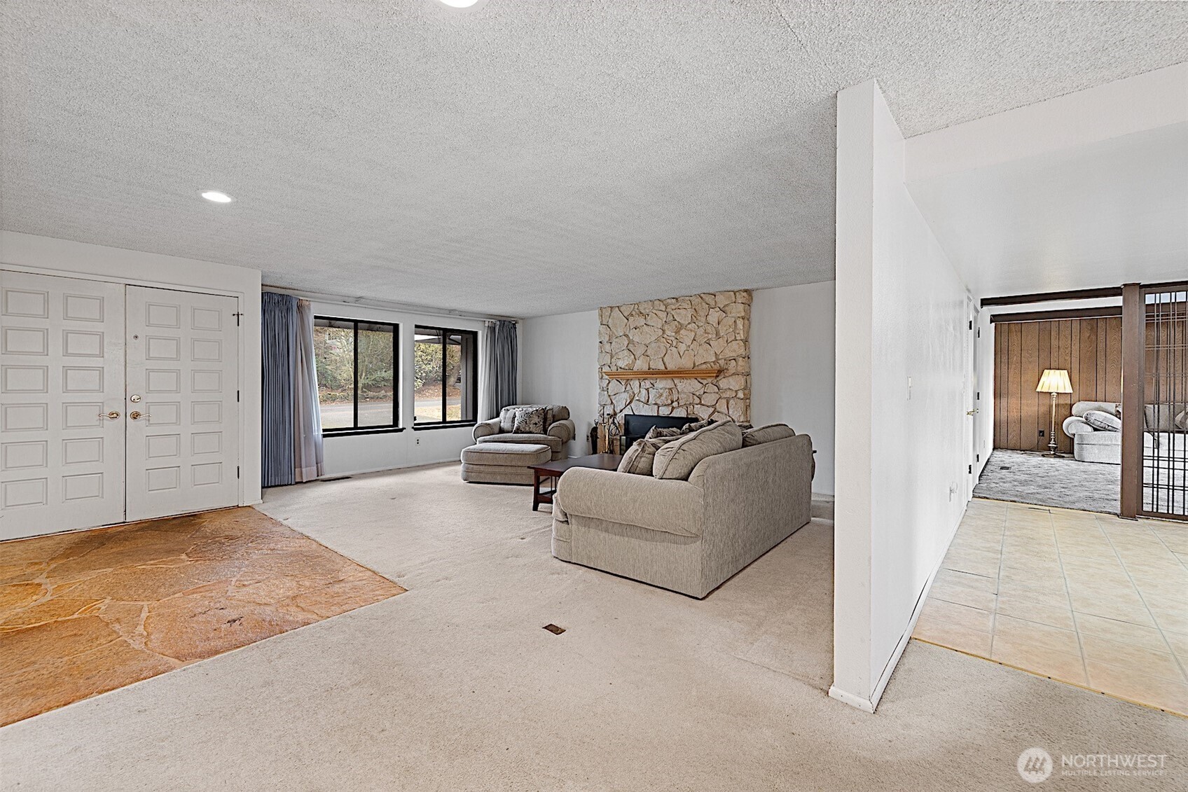 7407 Onyx Drive Southwest Lakewood, WA 98498 - Photo 6 of 40 a living room with furniture and a window