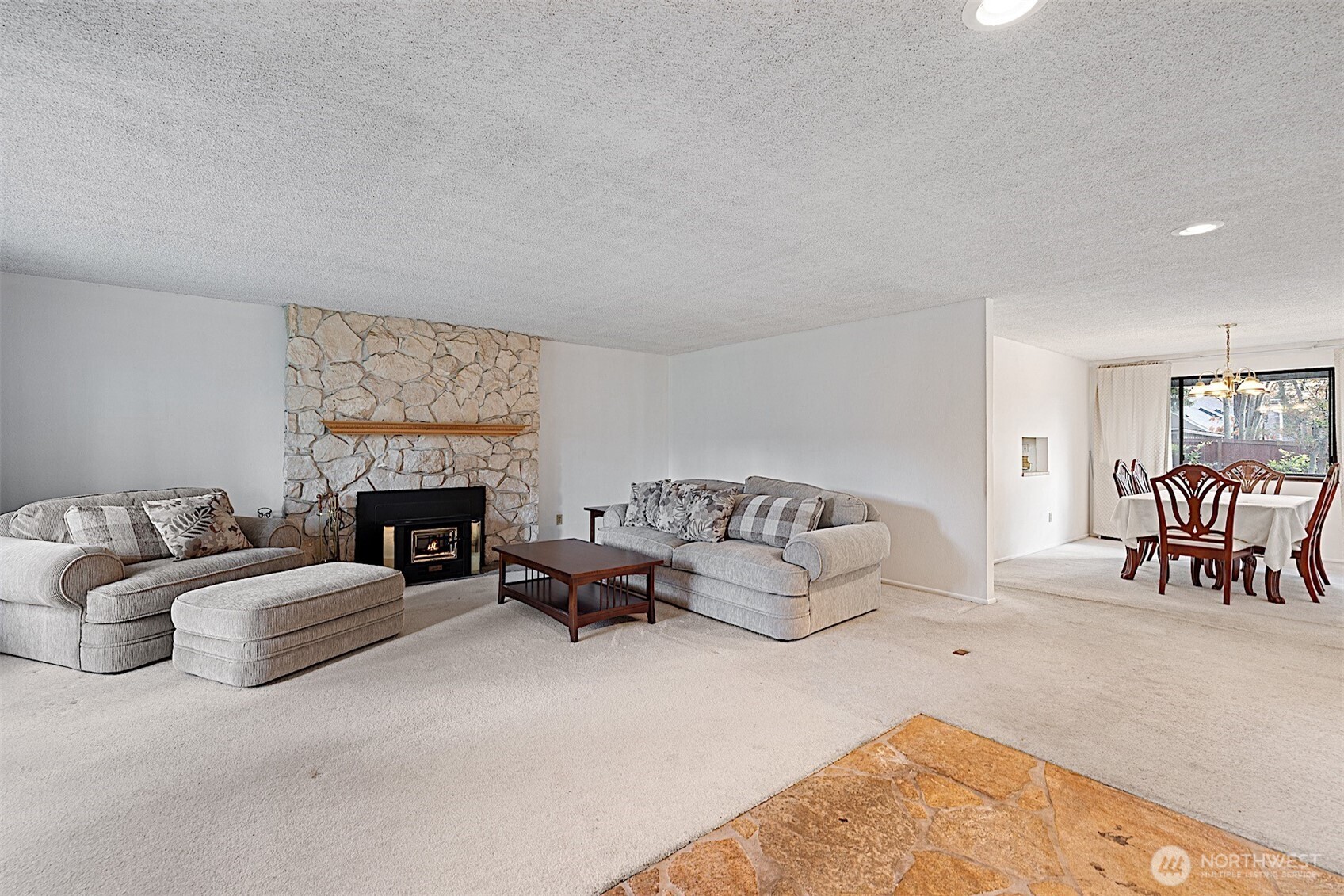 7407 Onyx Drive Southwest Lakewood, WA 98498 - Photo 8 of 40 a living room with furniture and a fireplace