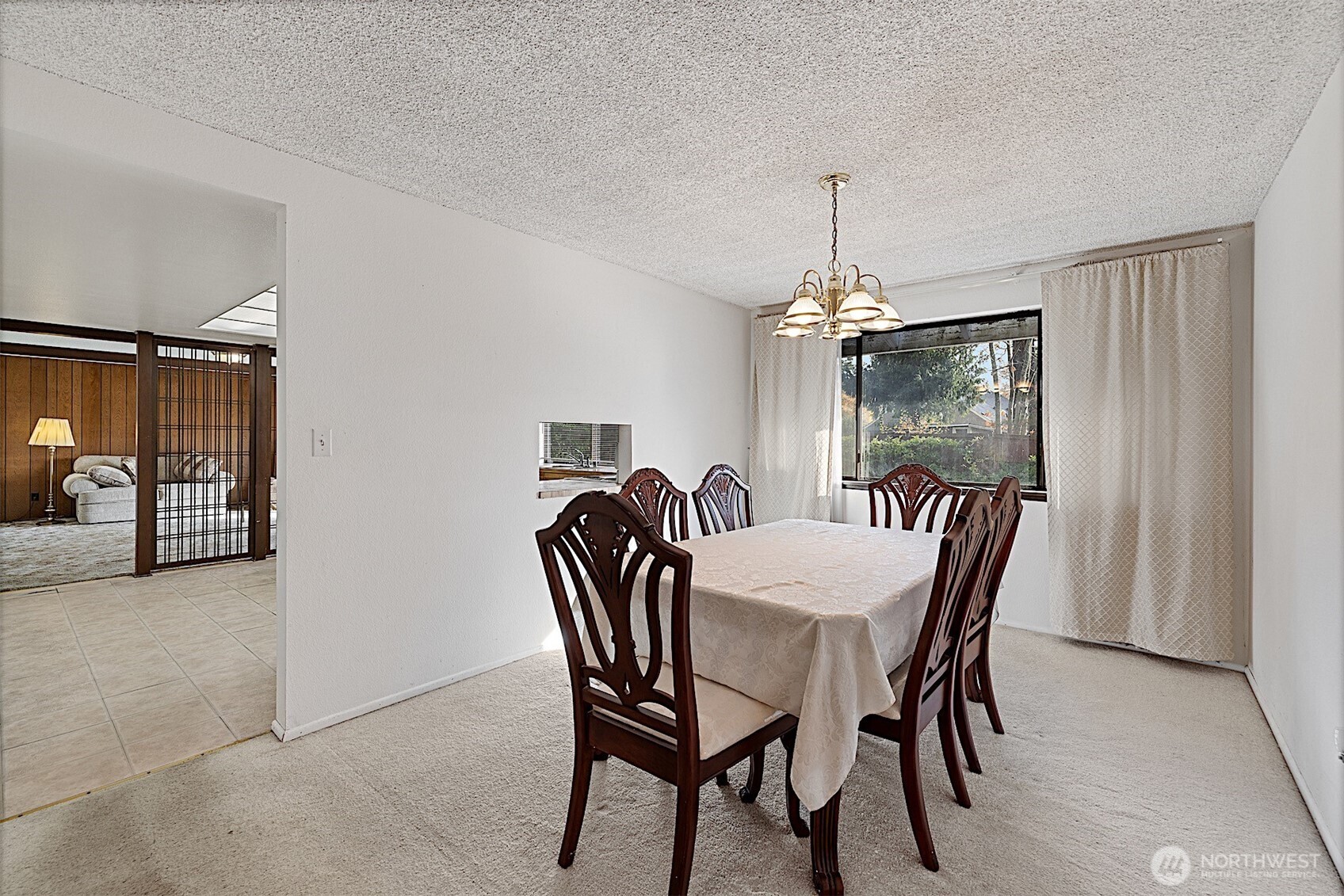 7407 Onyx Drive Southwest Lakewood, WA 98498 - Photo 9 of 40 a dining room with furniture and window