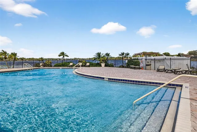 a view of a fountain in front of the house