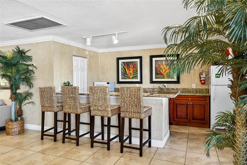 13824 Orange Sunset Drive, Unit 202 Tampa, FL 33618 - Photo 20 of 20 a dining room with furniture and a potted plant