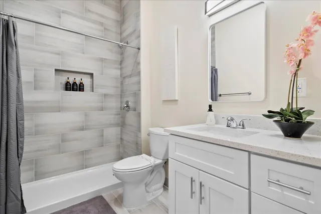 a vase of flowers sitting on a table