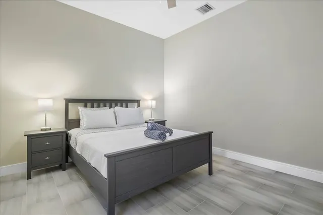 a living room with furniture a window and a table