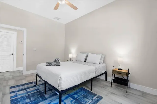 a bathroom with a shower and a bath tub